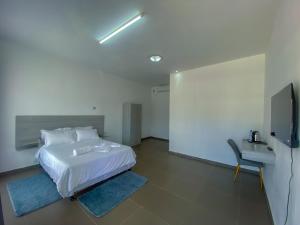 Postel nebo postele na pokoji v ubytování Massinga Guest House