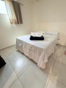 Postel nebo postele na pokoji v ubytování Chalé da Barra EG