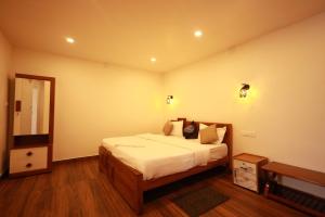 Ένα ή περισσότερα κρεβάτια σε δωμάτιο στο MT'S Villas