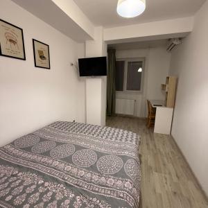 TV a/nebo společenská místnost v ubytování Cozy 2Rooms