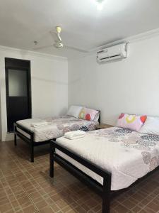 Ένα ή περισσότερα κρεβάτια σε δωμάτιο στο Hotel Miranda Tapachula