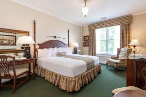 Postel nebo postele na pokoji v ubytování Saratoga Arms Hotel + 30 fotografií