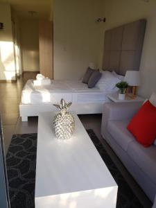 Ένα ή περισσότερα κρεβάτια σε δωμάτιο στο Convenient Studio Apt Near Airport, Beaches & Food
