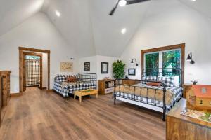 a living room with two beds and a couch at Beech Blessings in Beech Mountain