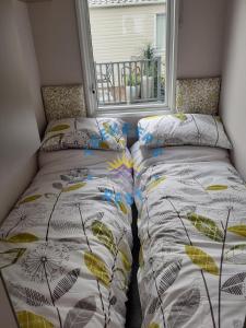 Postel nebo postele na pokoji v ubytování Trekkers Rest, Brigham, Cockermouth, Cumbria