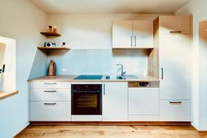 Kuchyň nebo kuchyňský kout v ubytování Fössing Hof.Apartment