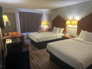 Postel nebo postele na pokoji v ubytování DaysInnByWyndham