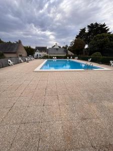 Bazén v ubytování Ti Olli Cocon chaleureux 300m plage nebo v jeho okolí