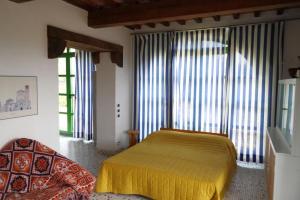 Voodi või voodid majutusasutuse Wohnung Sonnenaufgang In Monte Vibiano Vecchio toas +11 fotot