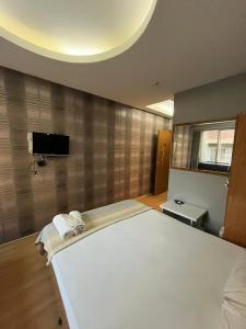 Μια τηλεόραση ή/και κέντρο ψυχαγωγίας στο Onn Guest House