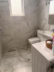 Koupelna v ubytování Rena Home