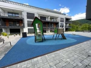 Herní místnost nebo prostor pro děti v ubytování Apartmán Raj