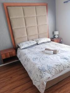 Giường trong phòng chung tại Muize at Sea