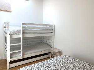 Ένα ή περισσότερα κρεβάτια σε δωμάτιο στο ELINA maison de charme à La Flotte