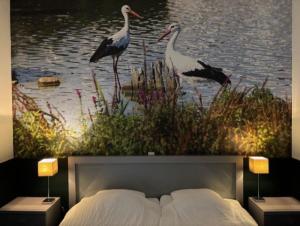 Postel nebo postele na pokoji v ubytování In de Kathoek - Beste voorwaarden via eigen kanaal + 3 fotografie