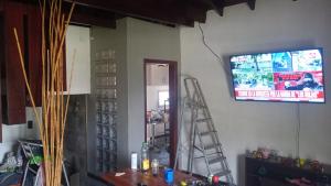 TV a/nebo společenská místnost v ubytování Zona constitución y tejedor