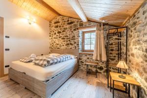 Ένα ή περισσότερα κρεβάτια σε δωμάτιο στο Garden and spectacular views