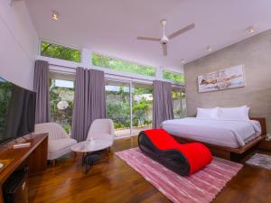 Un pat sau paturi într-o cameră la The Tranquil +74 fotografii