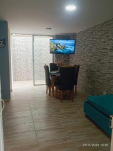 TV a/nebo společenská místnost v ubytování Casa Juli