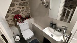 Ένα μπάνιο στο Alvesta Guest House