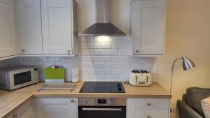 Köök või kööginurk majutusasutuses 2 Chapel Mews Sidmouth