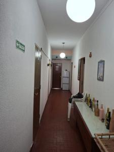a hallway of a hospital room with a long counter at hotel monte castello II in Villa Gesell