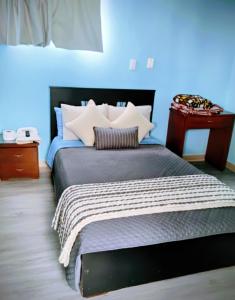 Postel nebo postele na pokoji v ubytování Hotel Bolivar