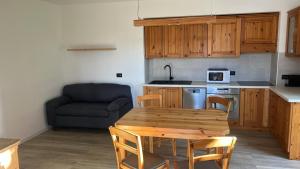 Kuchyň nebo kuchyňský kout v ubytování Appartamenti LaBiasa