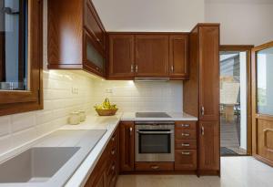 Η κουζίνα ή μικρή κουζίνα στο Kampos Villa Iii