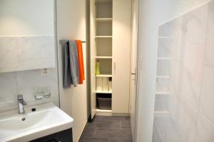 Ένα μπάνιο στο Ferienwohnung Rätia