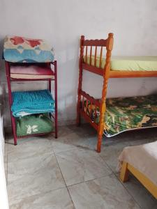 Una cama o camas en una habitación de Silva lugar aconchegante