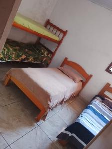 Una cama o camas en una habitación de Silva lugar aconchegante