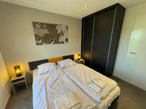 Ένα ή περισσότερα κρεβάτια σε δωμάτιο στο Chalet Sonnenplätzchen Zweite Reihe Haus Nr 229