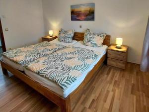 Voodi või voodid majutusasutuse Holiday Home in Birresborn with balcony toas