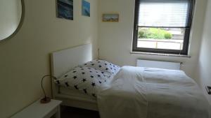 Una cama o camas en una habitación de Ferienwohnung Jakobs