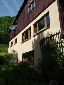 a building with a fence in front of it at Bergnest in Bad Gottleuba