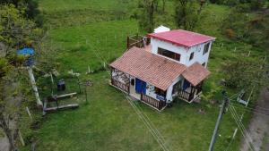 an overhead view of a house with a red roof at Mirador De Las Pirámides in Zetaquira