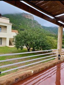 a view of the mountains from the porch of a house at Dar Nesri in Zaghouan