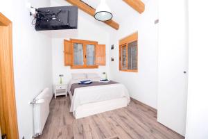 Una televisión o centro de entretenimiento en En el corazón de Sagunto