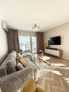 TV a/nebo společenská místnost v ubytování Apartament Charlotte 2