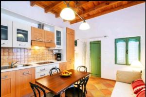 Kuchyň nebo kuchyňský kout v ubytování Ferienhaus Mit Blick Auf Das Wasser