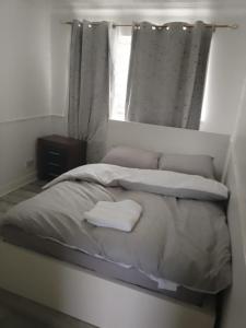 Giường trong phòng chung tại APEX HOUSE Le Hope ENSUITE