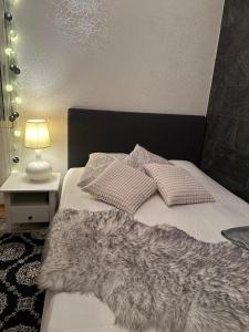 Ένα ή περισσότερα κρεβάτια σε δωμάτιο στο Havuille Lodge