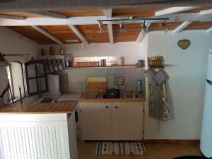 Kuchyň nebo kuchyňský kout v ubytování Charmante 3 Villa La Milouyette