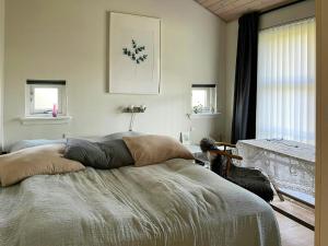 Postel nebo postele na pokoji v ubytování Holiday Home With Sauna Near Anneberg