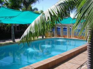 Majoituspaikassa Palm Waters Holiday Villas tai sen lähellä sijaitseva uima-allas