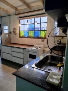 Η κουζίνα ή μικρή κουζίνα στο Refugio Urbano