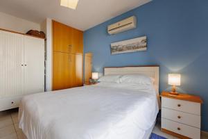 Ένα ή περισσότερα κρεβάτια σε δωμάτιο στο Kapparis Beach Escape