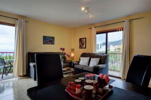 Posezení v ubytování Ferienwohnung Belair Mit Pool