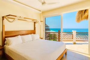 Voodi või voodid majutusasutuse Beachfront in a peaceful Resort 8mi from Puerto Escondido toas